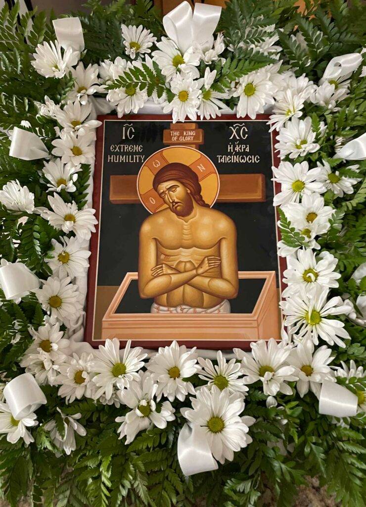 icon of Jesus and flowers at holy trinity in norwich ct